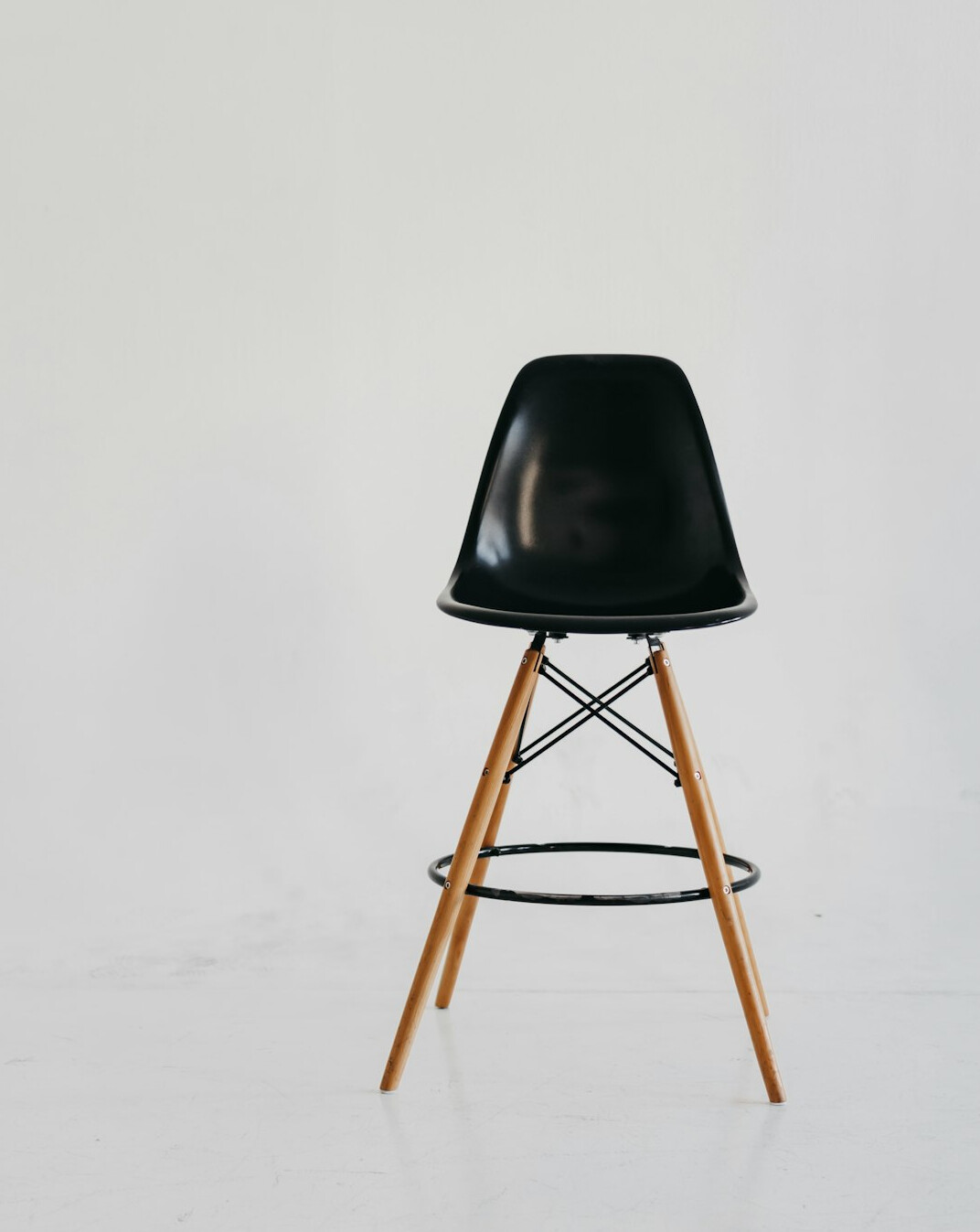 Vintage wooden chair against a plain wall